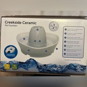 Brand new Creekside Ceramic Pet Fountain with filters.